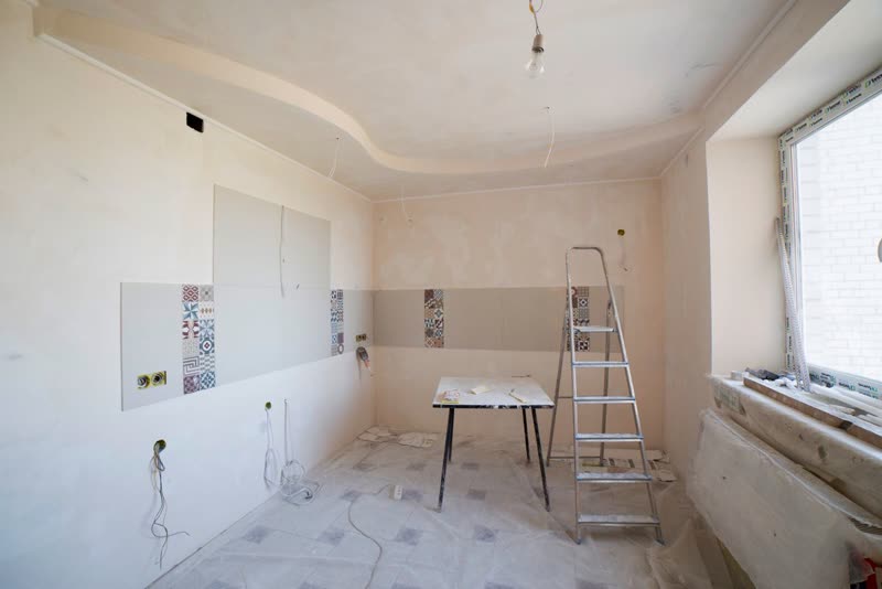 Bathroom stripped back to bare walls part-way through a renovation